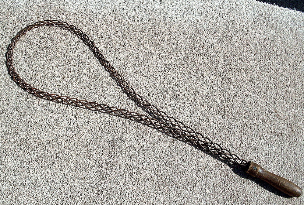 antique braided metal rug beater wood handle collectible display