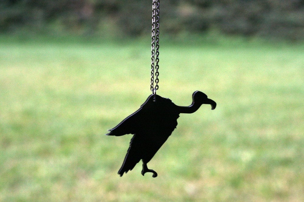 Laser cut vulture necklace