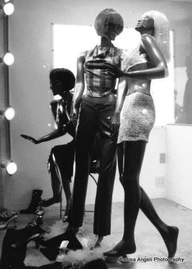 Three pink mannequins. Matted fine art photograph.