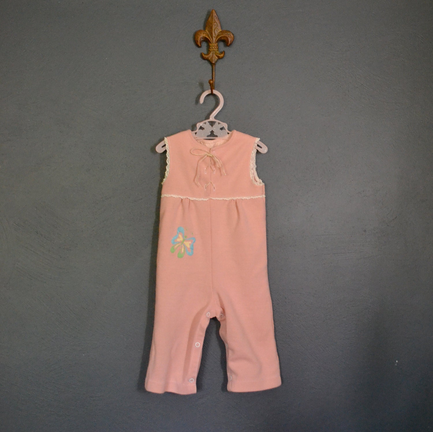 1970s Baby Girl Sleeveless Peach Pants Romper / Playsuit with Lace Up Neckline / size 12 months