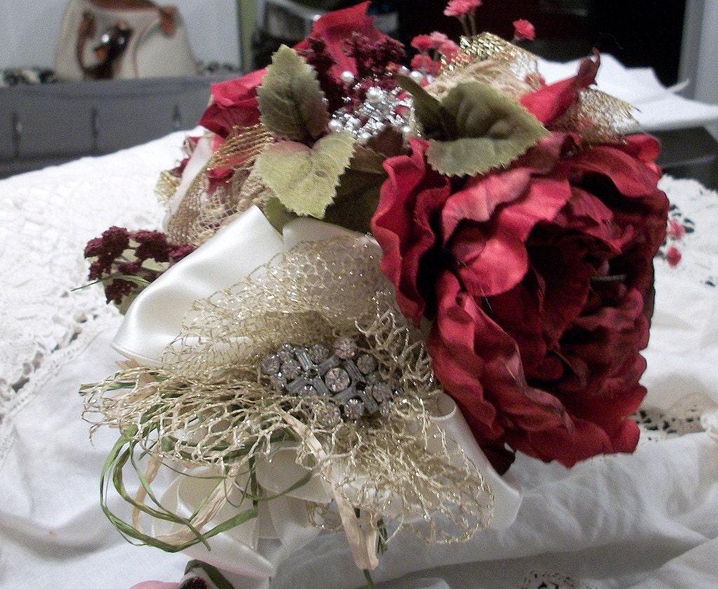 Red rose bouquet with rhinestone brooches