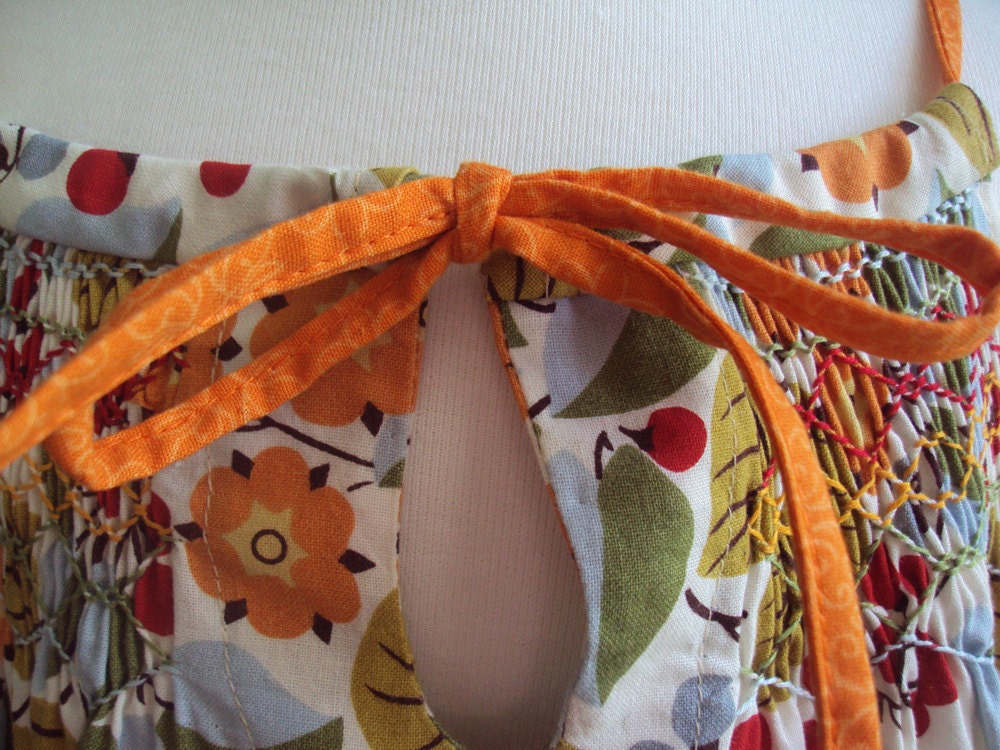 Floral smocked sundress with key closure size 4 ready to ship