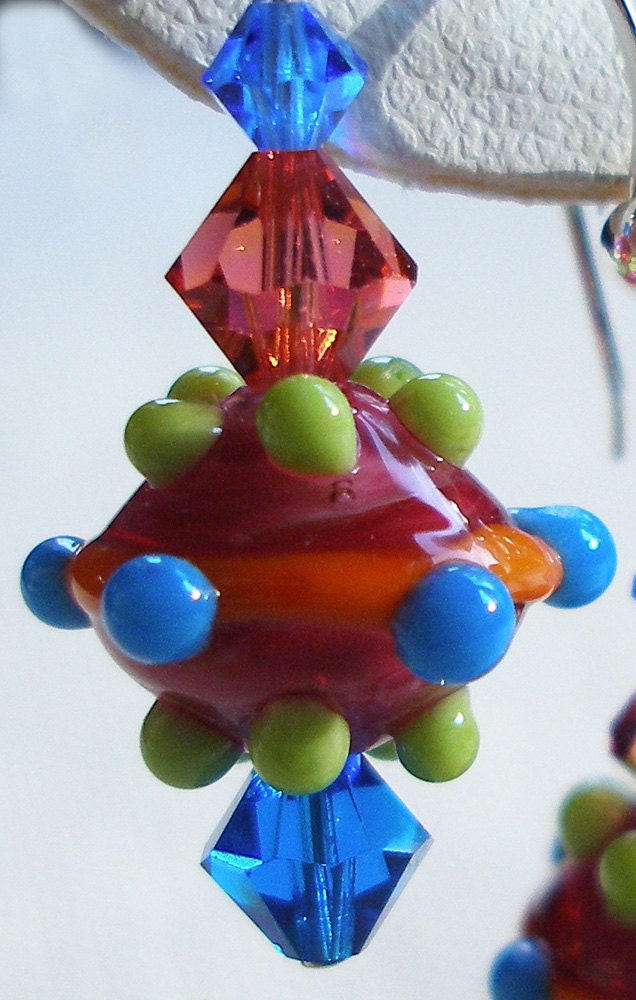 Sizzling Orbit Earrings Blast Off With Colors of Burgundy, Orange, Lime Green, and Blue--the Hot Retro Look is So Contemporary