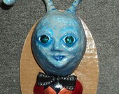 Apicius, gluttonous snail man with a big appetite paper mache sculpture