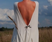 Creamy open-back cotton Milk and honey LeMuse dress with little black bow on the back