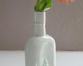 Slip Cast Porcelain Bottle with a Floral Pattern
