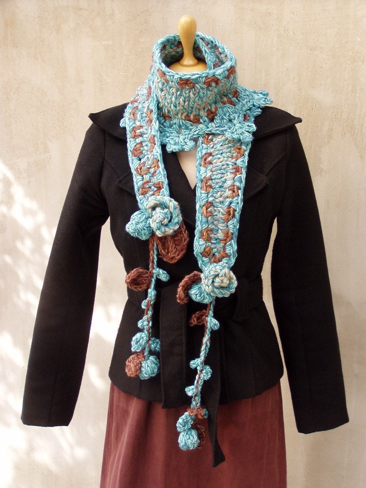 Aqua freeform hand crocheted and hand knitted scarf with tufted garnishee