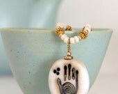 Healing Hand Glass Bead Necklace. Ivory & Blue Artisan Focal Bead. Lampwork Bead Jewelry. Glass Bead Jewelry.  Spiritual Jewelry.
