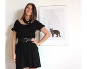 Little Black cotton knit dress with pockets and ruffle sleeve