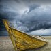 Boat on Beach with Storm Brewing A Fine Art Wall Decor Photograph