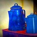 Blue Coffee Pots on Red Stovetop - A Fine Art Photograph