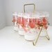 Pink and White Glasses with Kitchen Housewares Design in Metal Glass Caddy