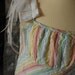 Pretty girls summer dress in pastel colours. Age 8 - 9 years, white, pale pink, orange, turquoise with frills, party dress
