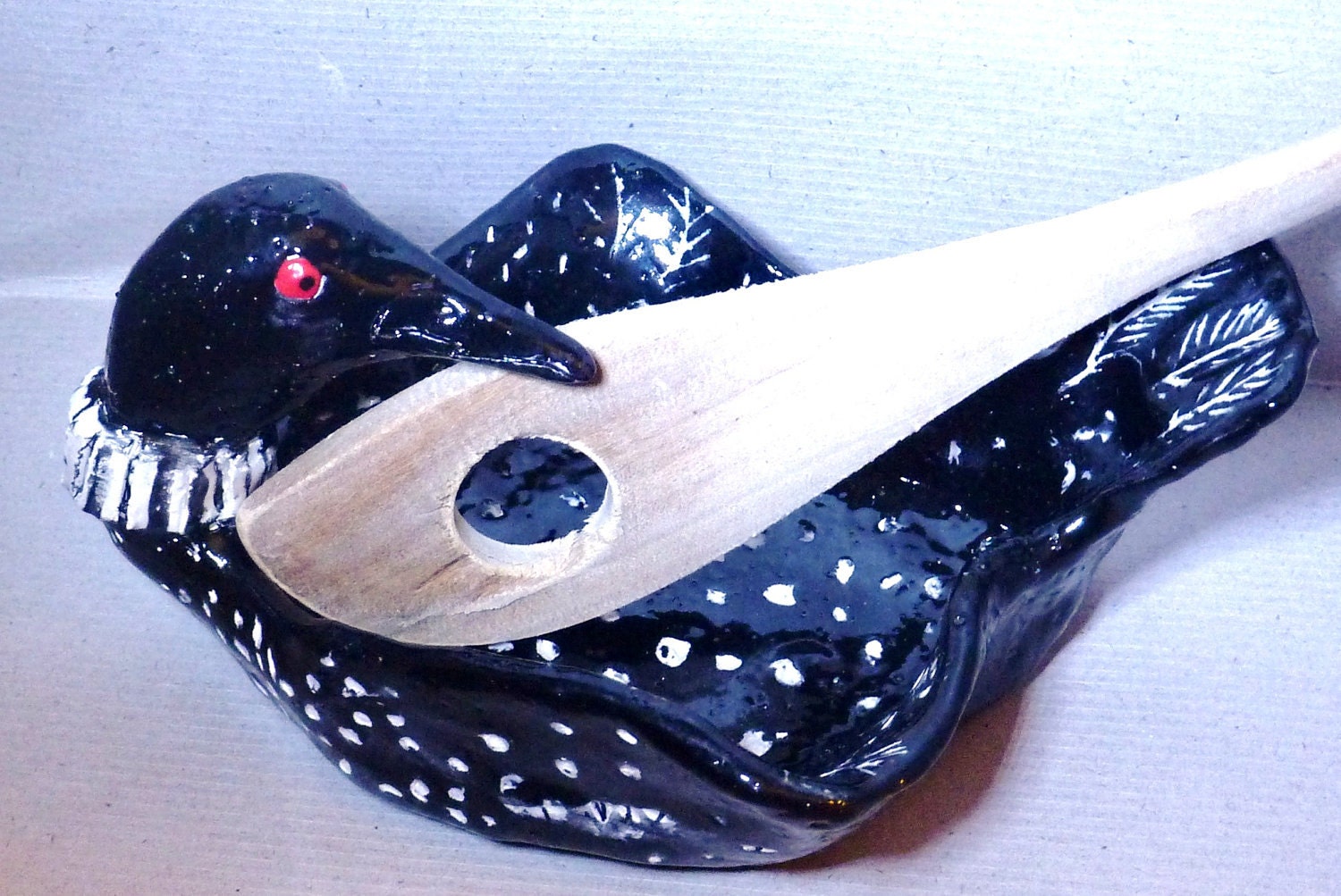 Loon spoon rest handmade in USA from a lump of clay. scraffito technique one of a kind