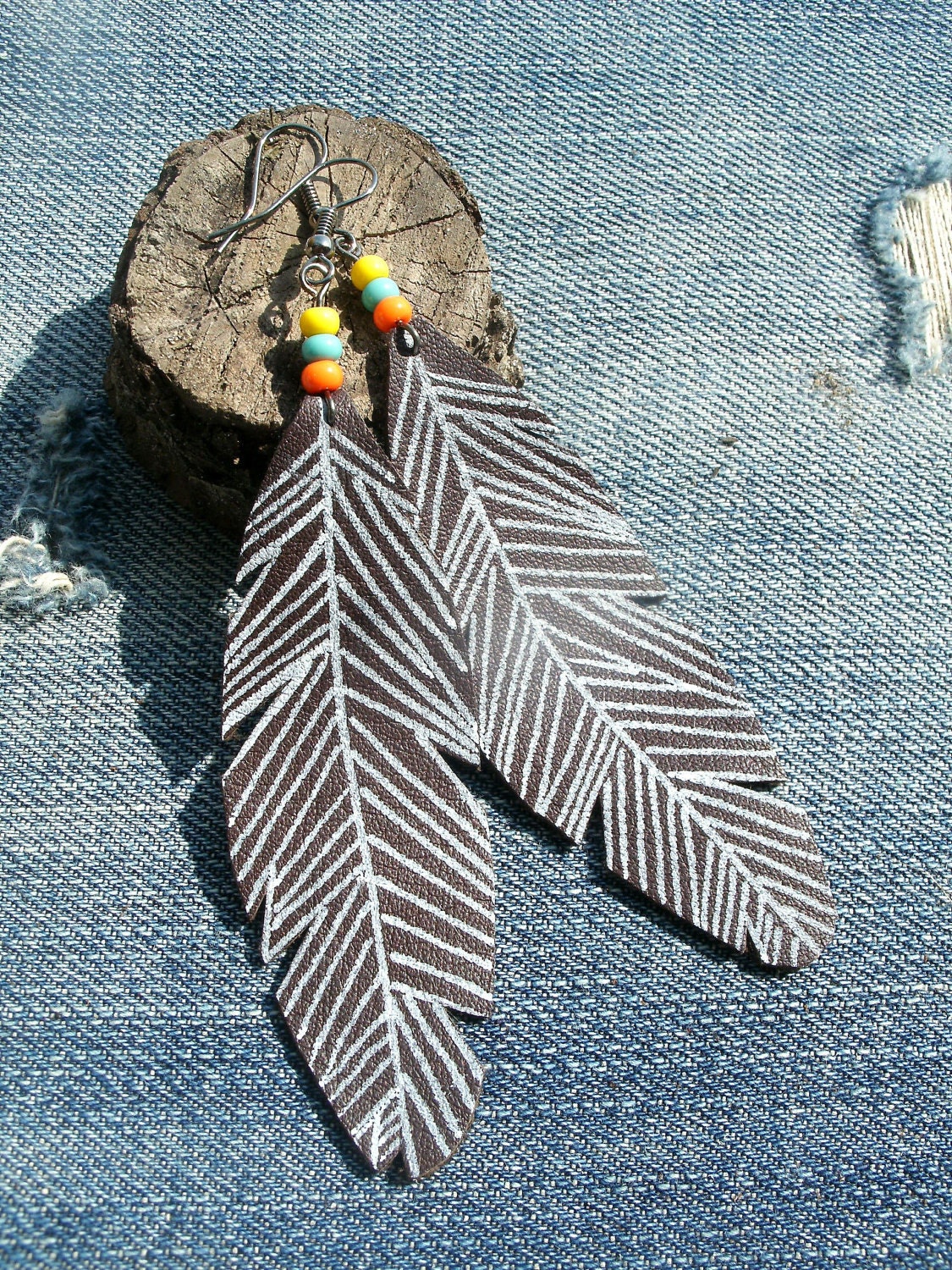 earthy bohemian leather feather earrings with bead detail, handmade from salvaged leather, one of a kind