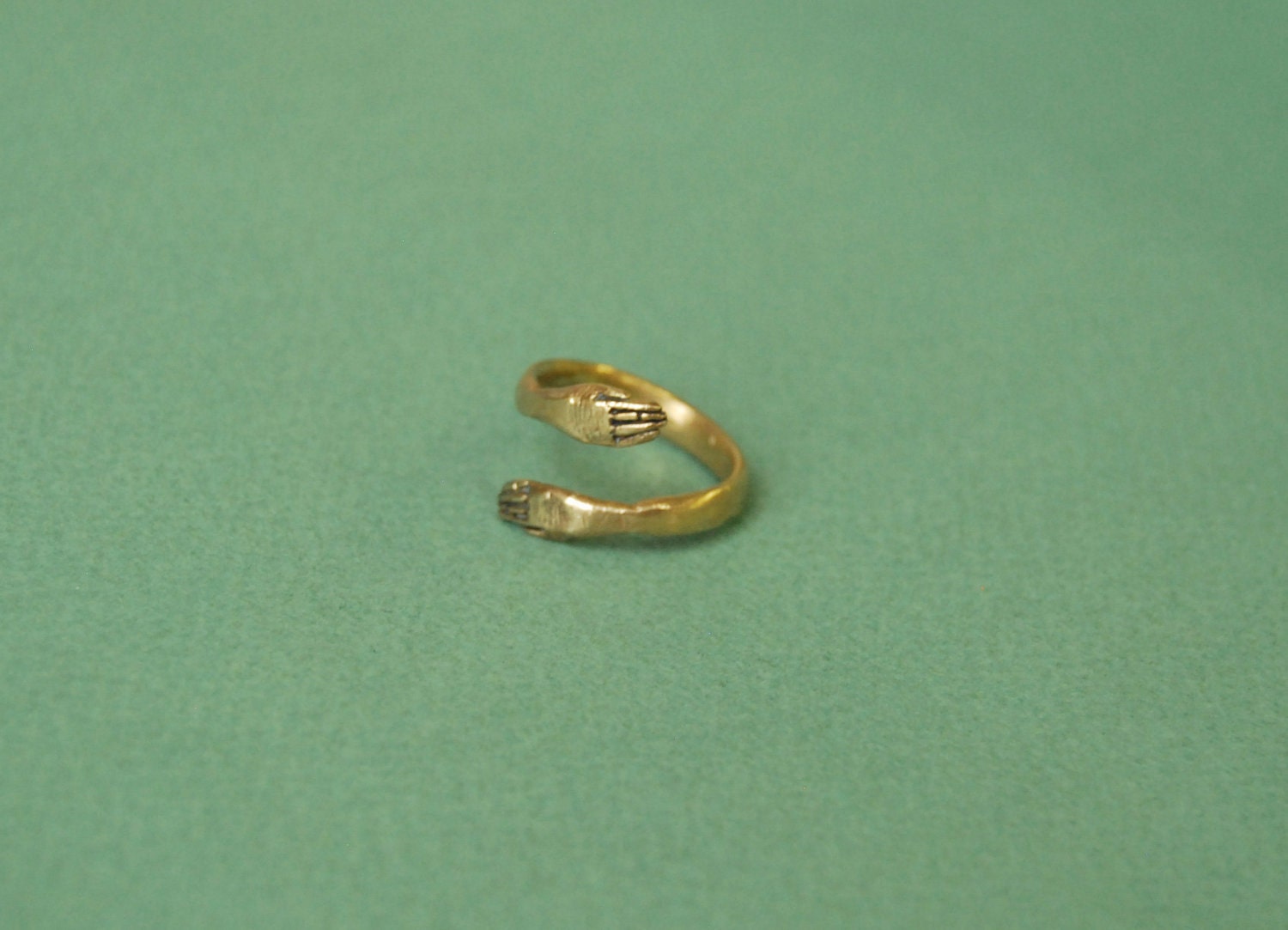 Golden protective hand ring