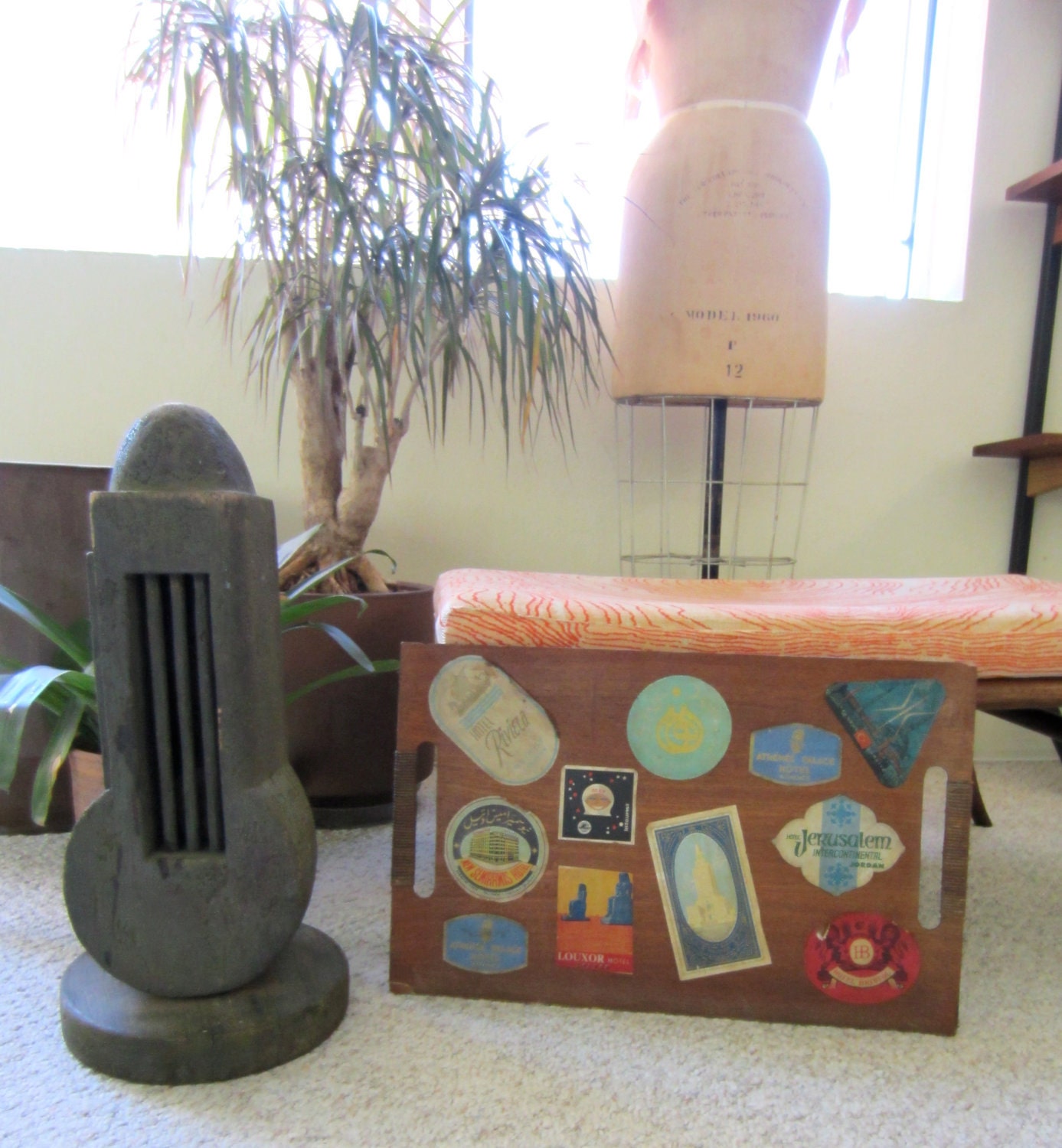 vintage wooden tray with luggage stickers from hotels