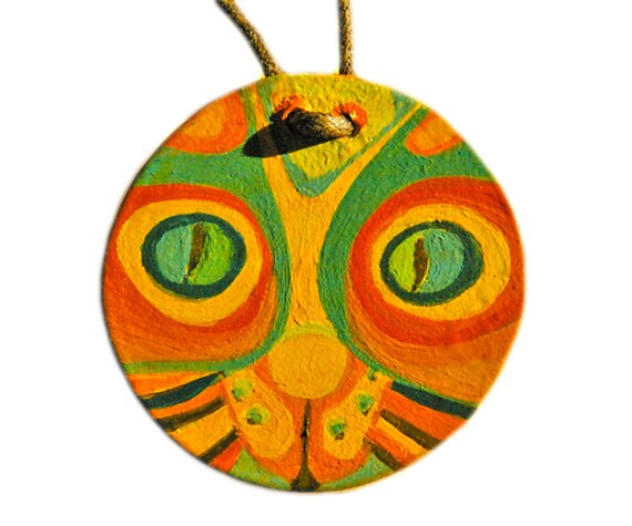 Cat Pendant Orange and Green. Hand painted round pendant with original design One of a kind