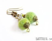 Apple green dangled earrings.