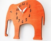 The "Oh, My Orange Elephant" designer wall mounted clock from LeLuni