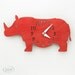 The "Rotund Rhino in Red" designer wall mounted clock from LeLuni