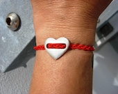 Handmade Women Sterling silver heart bracelet on breaded red elastic cord