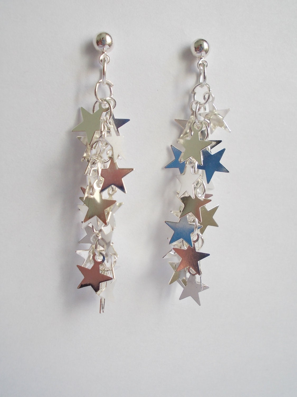 Stars earrings silver. Long dangle with tiny sparkling stars on chain. Earstuds