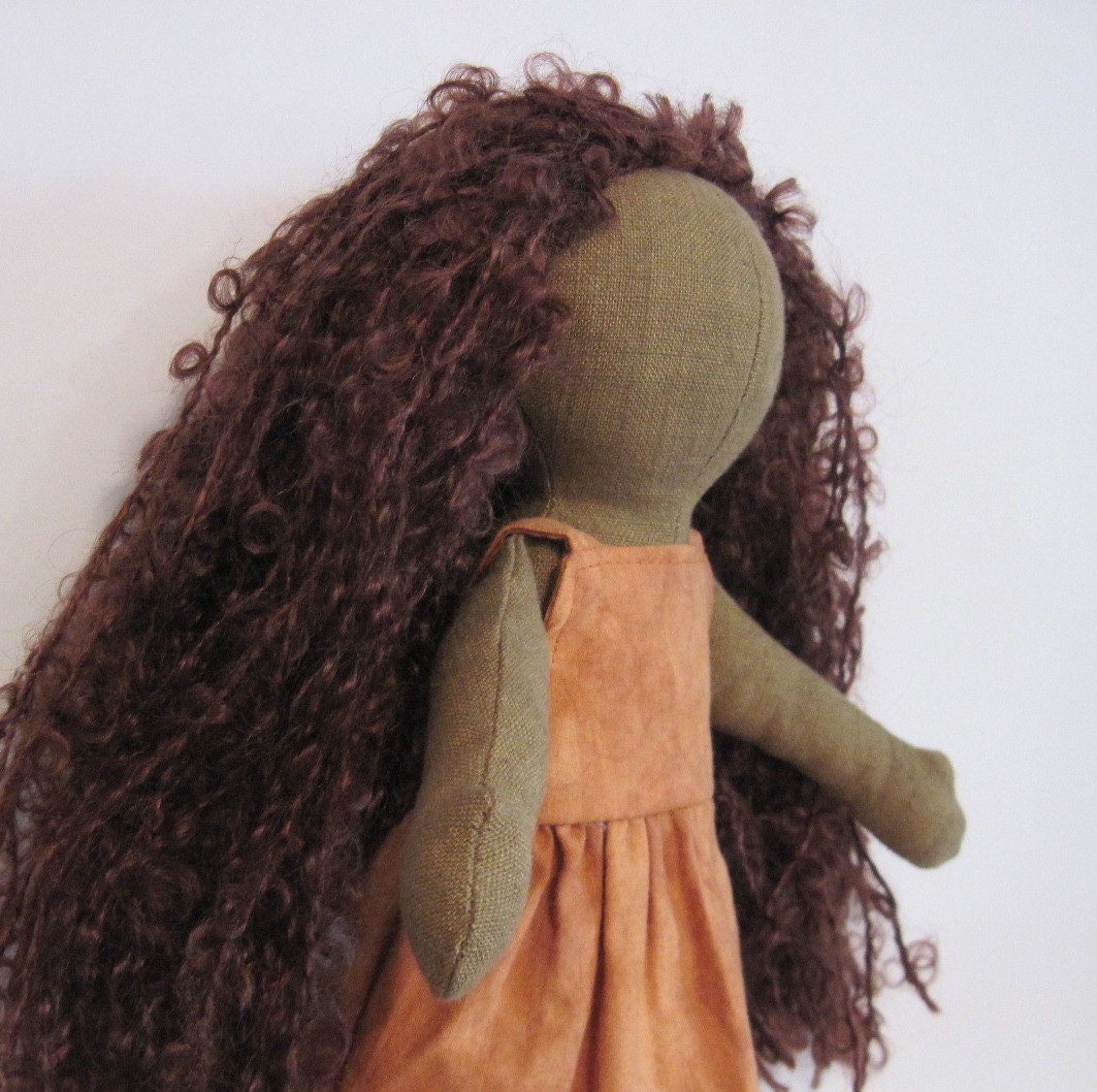 11" Brown eco-friendly doll with curly brown hair