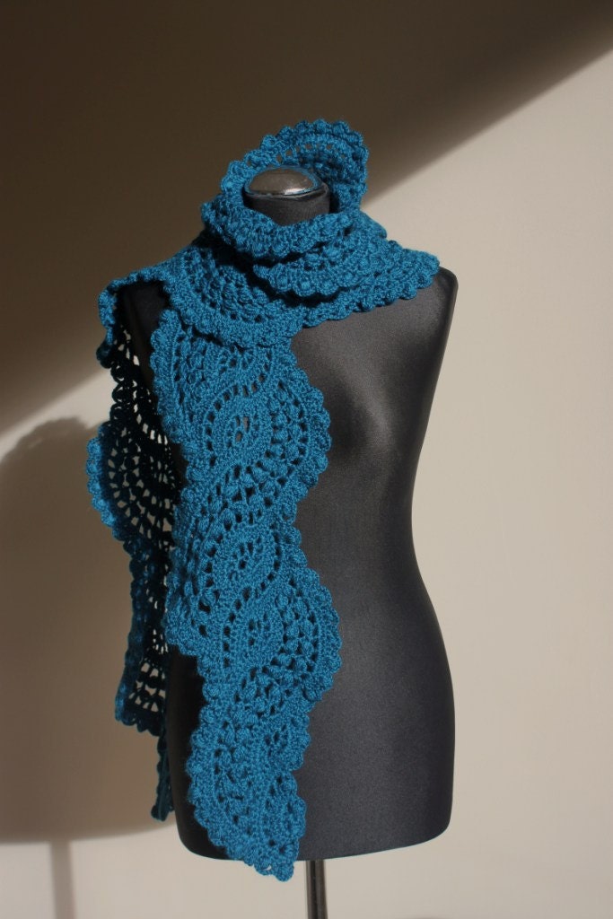 Crocheted lace scarf in turquoise teal