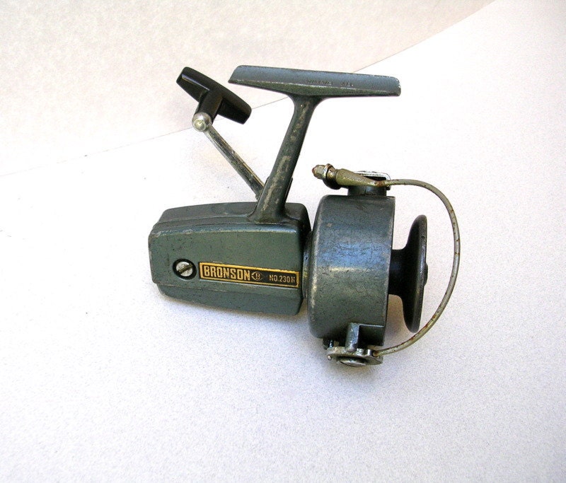 Vintage Fishing Reel.  Bronson Reel, Army Green, Freshwater or Light Ocean Reel.  Sports Equipment, Industrial Display.