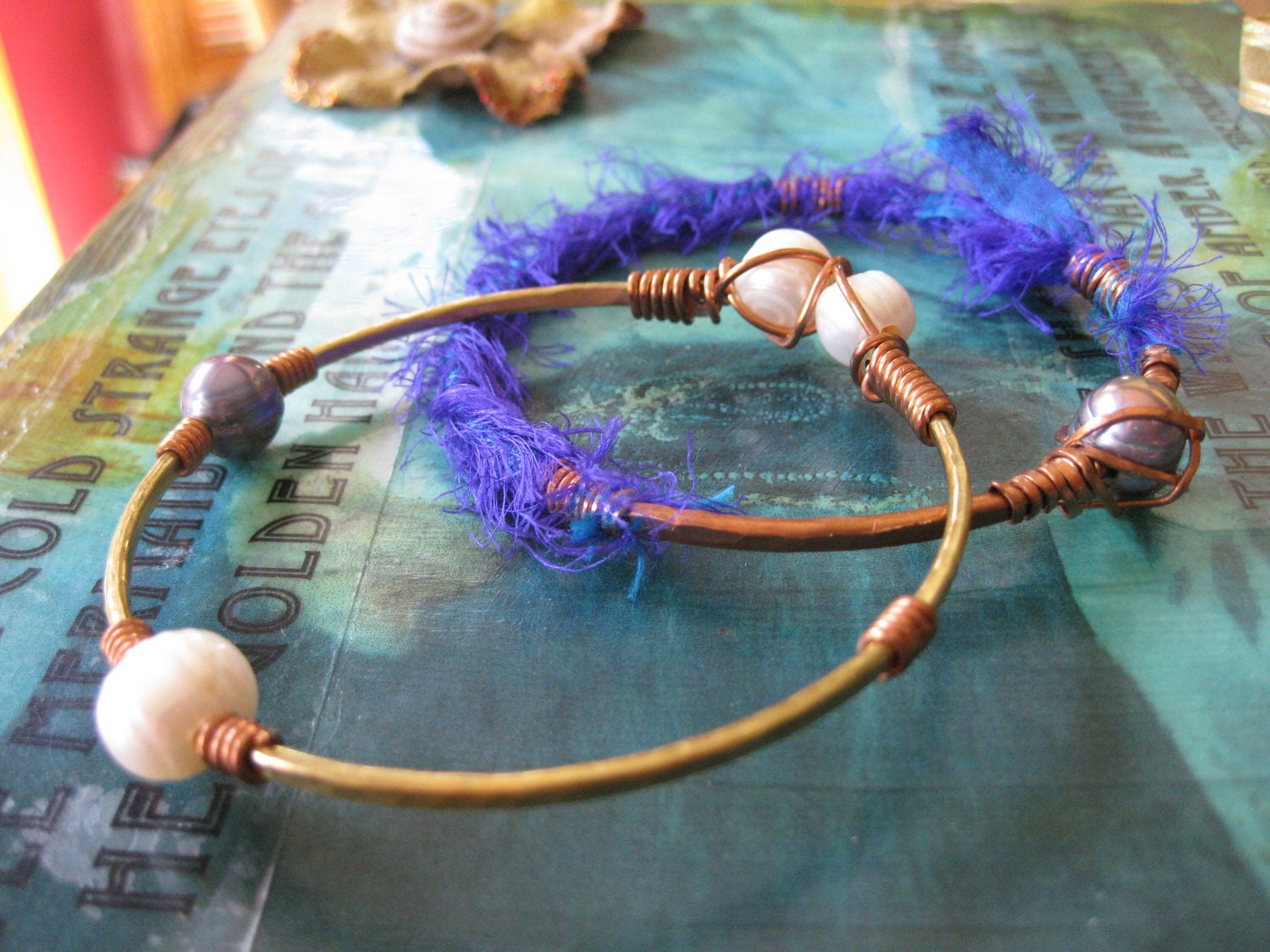 King Neptune's gifts - fresh water pearl and silk hand forged brass and copper bangles