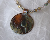 Fine Silver Little Bird Necklace with copper and blue tones