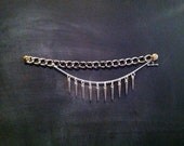 silver spike and multichain bracelet