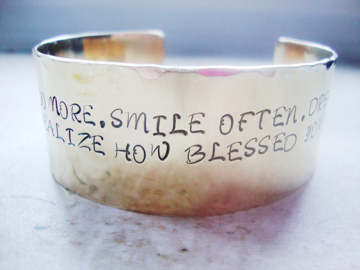 Wide brass statement cuff hand stamped with inspirational words