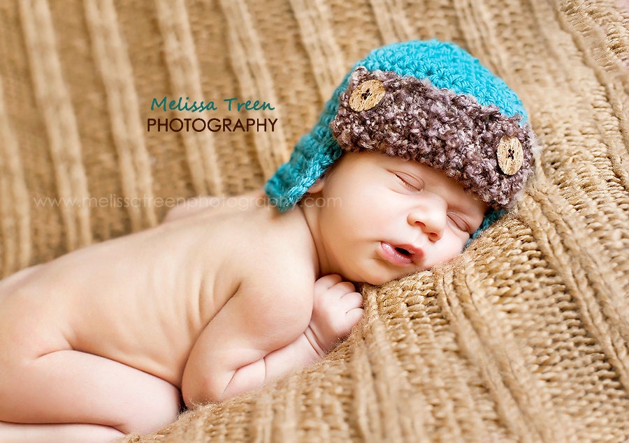 newborn crochet baby hat photo prop aviator hat in turquoise with chunky brown trim and buttons
