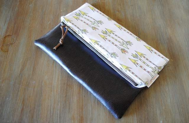 arrow clutch. fold over clutch