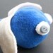 beady-eyed flying blue scrap monster