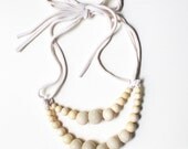 Color Pop Necklace in Vanilla & Cream . Non-toxic Beads with a Jersey Tie . Fashionable and baby-friendly