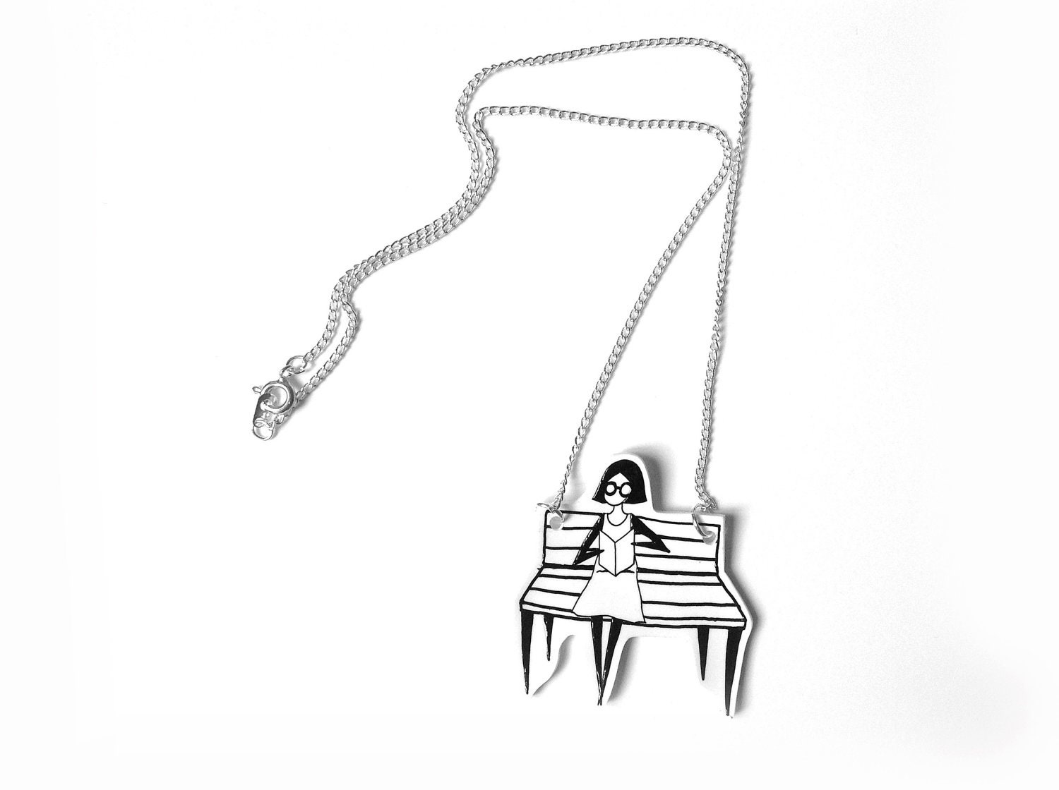 hand painted illustration on shrink plastic jewelry - Bookworm