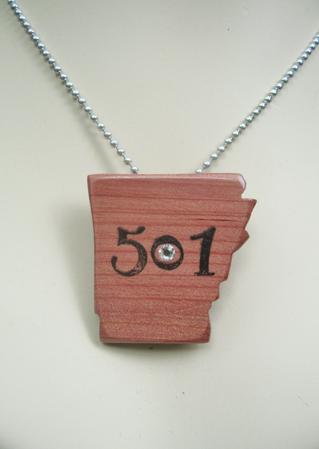Upcycled Eco-Friendly Fallen Cedar Tree carved Arkansas State Pendant