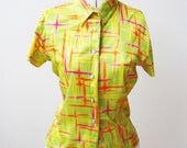 reduced.1990s short sleeved techno colored CLUB-KID shirt. Medium.