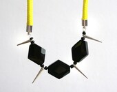 Neon rope spike necklace with faceted gemstones. spike jewelry