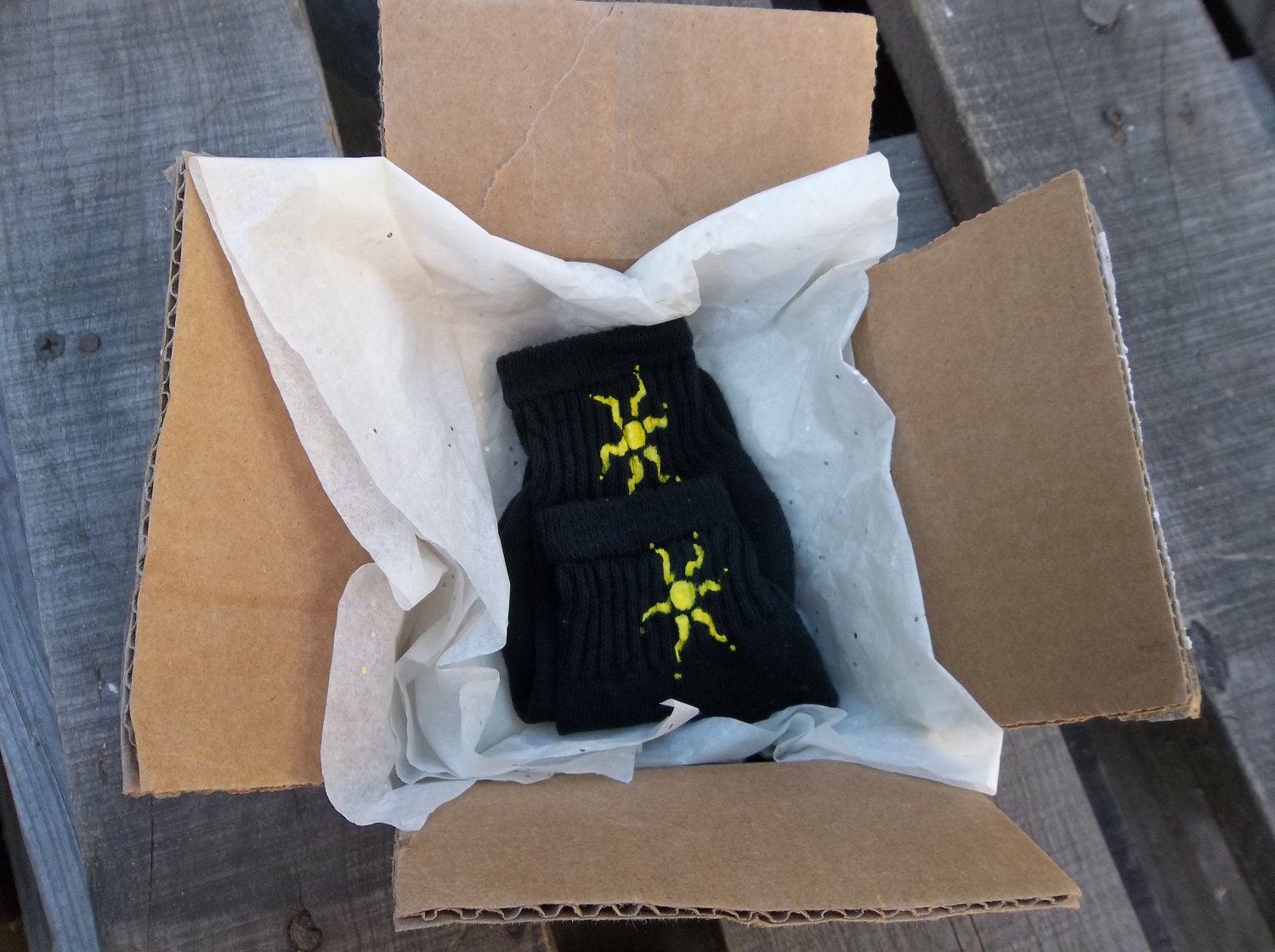 a "Summer Sunshine" - Hand Painted Black Socks for Bigger Feet: Simple Tribal Sun (kid large/xl - women's xs/small)