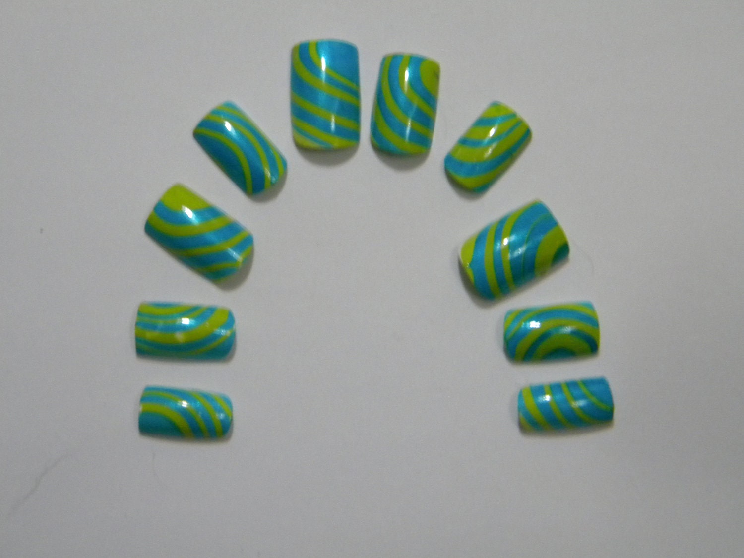 Bright Blue and Green Water Marble Nails