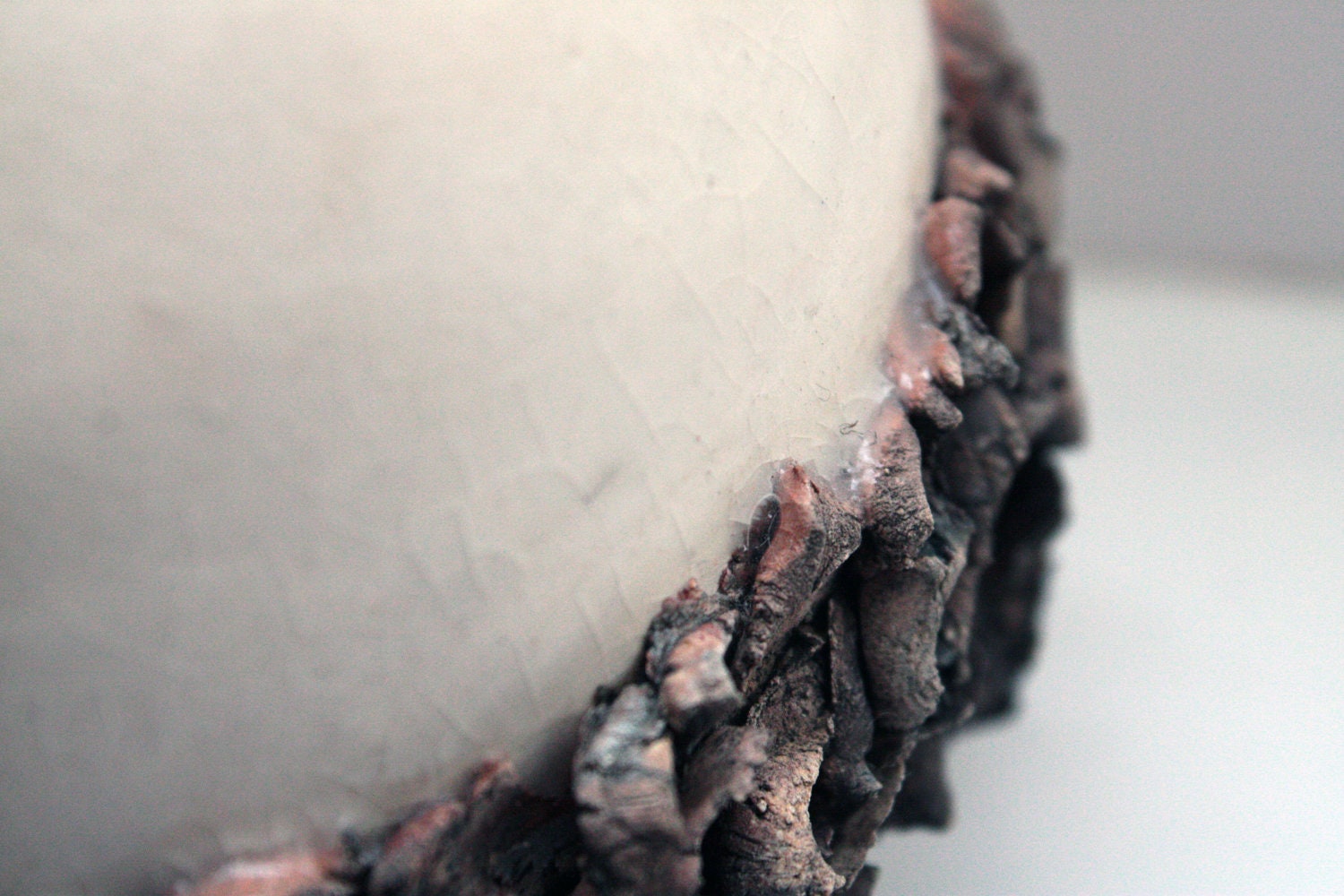 Ceramic sphere vase with white stoneware and red sanded clay.