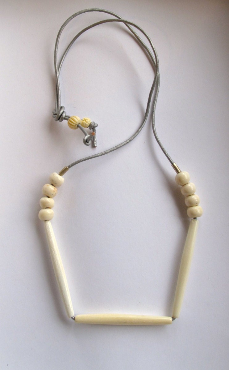 White minimalist strand necklace silver beads on silver leather cord geometric