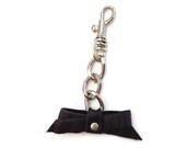 Bow key charm in black leather