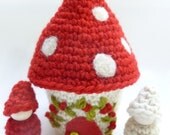 Wee mushroom cottage with peg dolls
