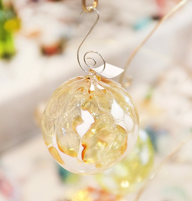 Handblown gold & white glass ornament