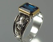 GUARDIAN ANGELS silver and 14K ring with emerald cut London Blue Topaz